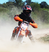 Rider charging through the dust